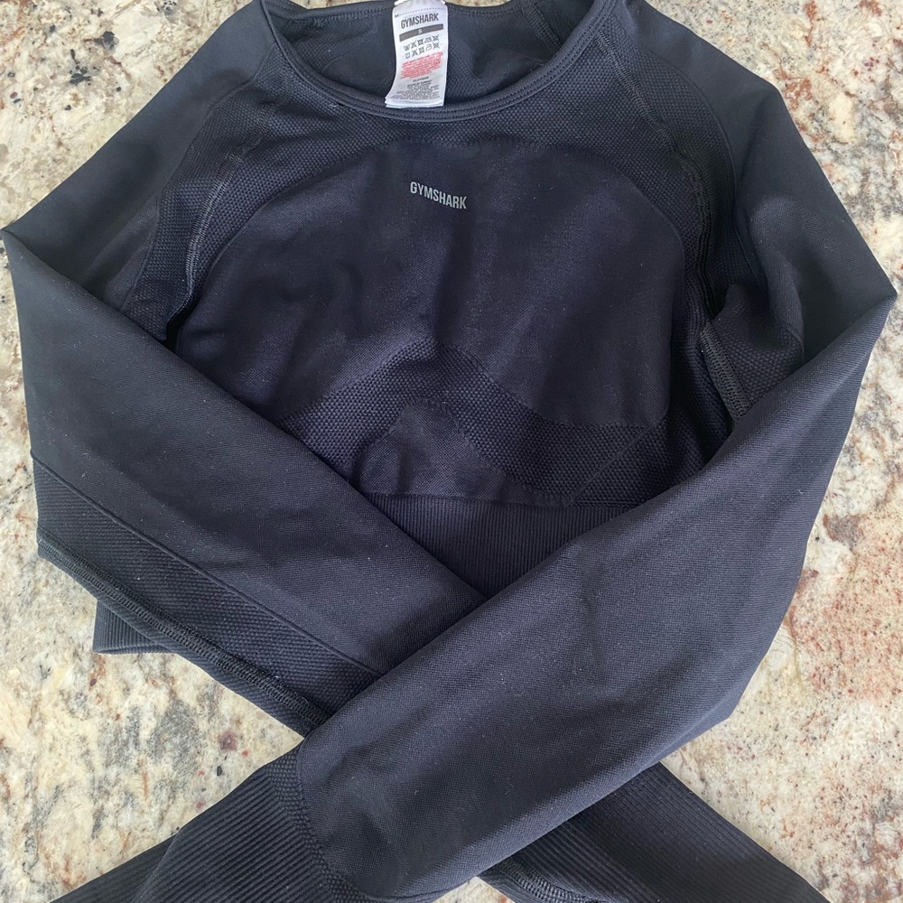 GYMSHARK black tight cropped long sleeve workout top. with open back